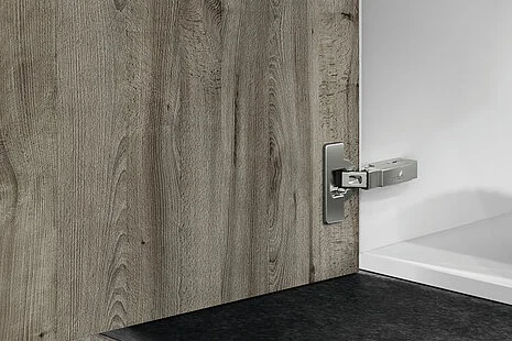 Hettich Intermat concealed soft-close cabinet hinge with clip-on mounting plate