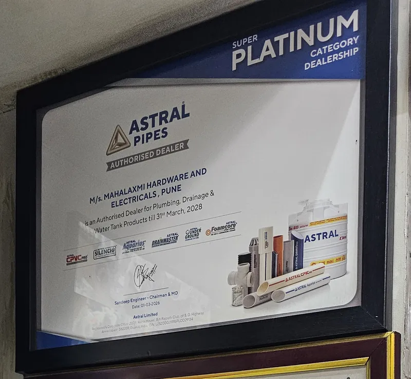 Framed Astral Pipes certificate naming M/s. Mahalaxmi Hardware and Electricals, Pune as an Authorised Dealer for Plumbing, Drainage and Water Tank Products