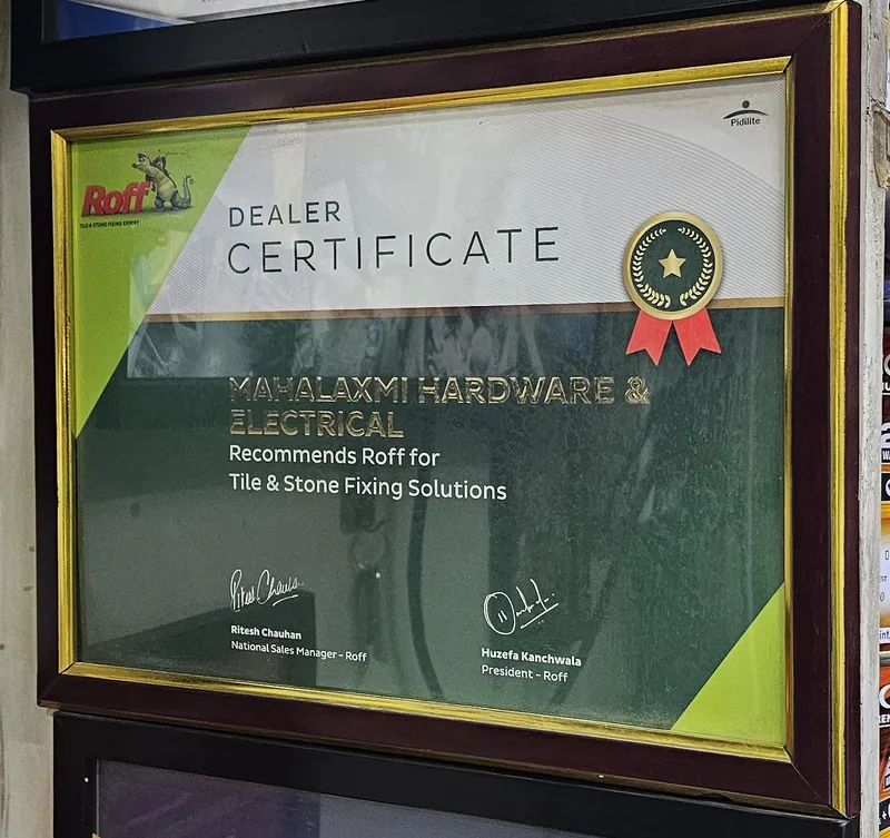 Framed Roff dealer certificate issued to Mahalaxmi Hardware and Electrical for tile and stone fixing solutions