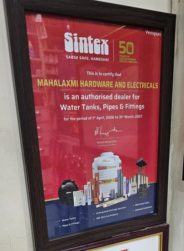 Framed Sintex certificate stating that Mahalaxmi Hardware and Electricals is an authorised dealer for Water Tanks, Pipes and Fittings