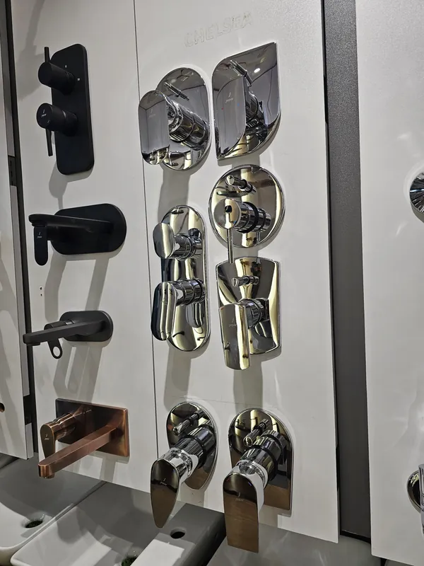 Jaquar single-lever concealed diverters in chrome on display at Mahalaxmi Ceramics